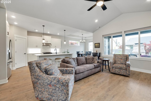 1332 SE 14th Ave, Canby, OR 97013 - living room featuring recessed lighting, ceiling fan, light wood-type flooring, vaulted ceiling, and baseboards