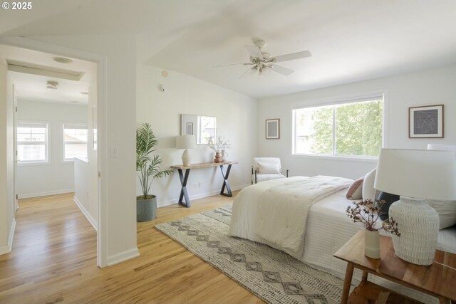 2814 NE 34th Ave, Portland, OR 97212 - bedroom featuring light wood finished floors, baseboards, lofted ceiling, and a ceiling fan