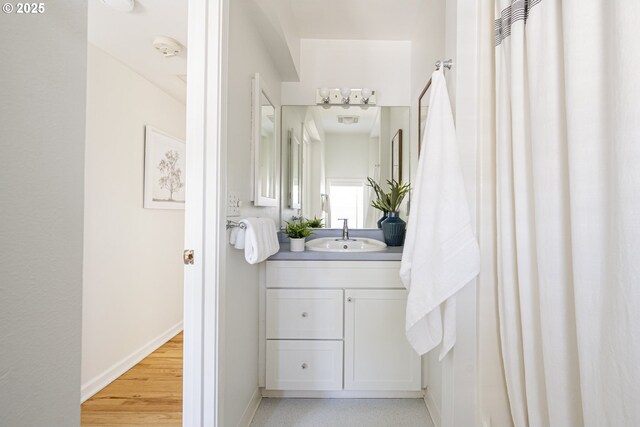 2814 NE 34th Ave, Portland, OR 97212 - bathroom featuring vanity and baseboards