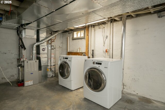 2814 NE 34th Ave, Portland, OR 97212 - laundry room with separate washer and dryer, water heater, and heating unit