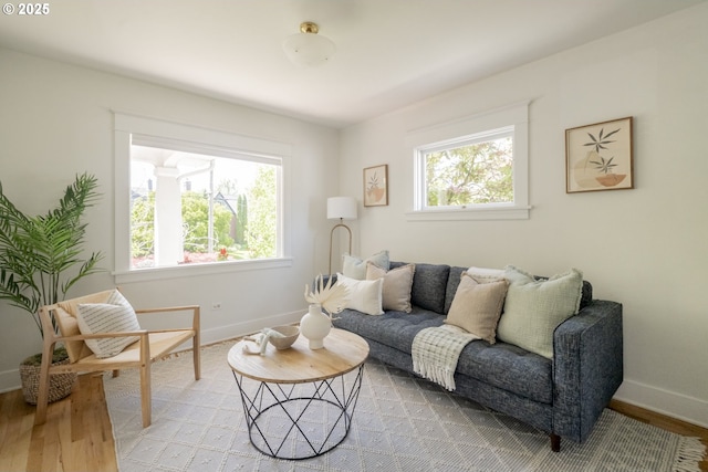 2814 NE 34th Ave, Portland, OR 97212 - living room featuring baseboards and light wood-type flooring