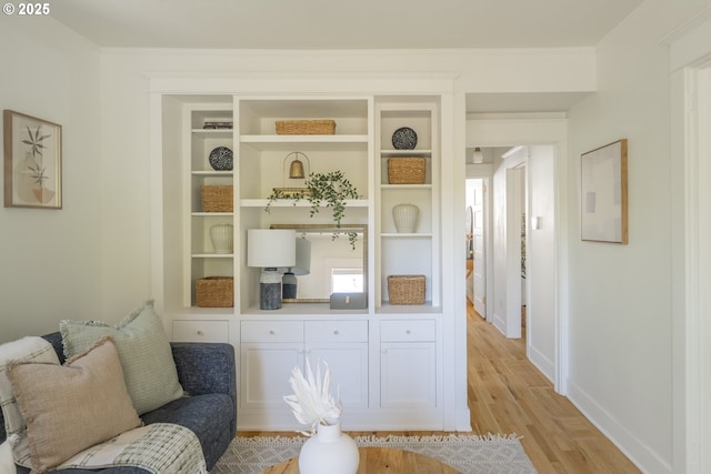2814 NE 34th Ave, Portland, OR 97212 - living area with light wood-style floors, baseboards, and crown molding