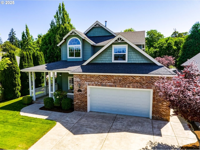 4675 Symphony Dr, Eugene, OR 97404 - craftsman-style house featuring covered porch, driveway, a front lawn, and a shingled roof