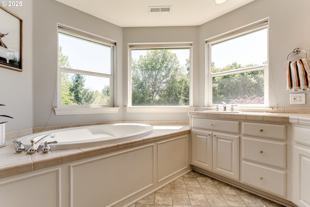 4675 Symphony Dr, Eugene, OR 97404 - bathroom with a bath, vanity, and tile patterned flooring