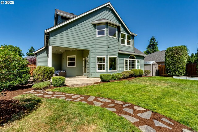4675 Symphony Dr, Eugene, OR 97404 - back of property featuring a storage shed and a patio