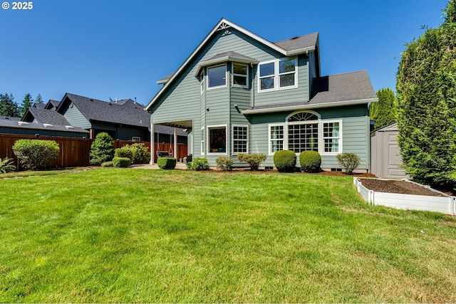 4675 Symphony Dr, Eugene, OR 97404 - rear view of house with a storage shed and roof with shingles