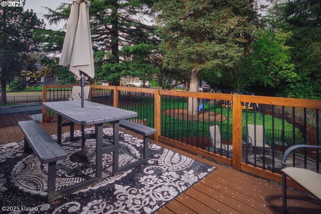 8510 SW Cedarcrest St, Portland, OR 97223 - wooden deck featuring outdoor dining area and a lawn