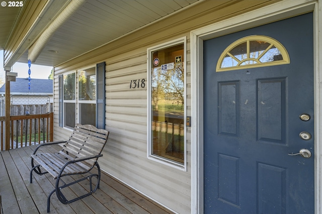 doorway to property with a porch