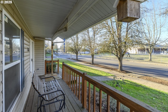 wooden terrace with covered porch