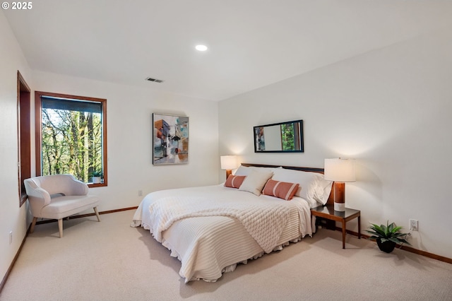 carpeted bedroom with baseboards, recessed lighting, and visible vents
