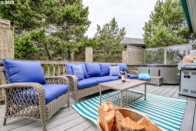 deck featuring outdoor lounge area