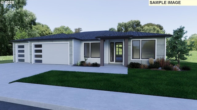 view of front of property featuring a front lawn and a garage