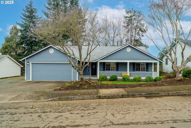 ranch-style house with covered porch and a garage