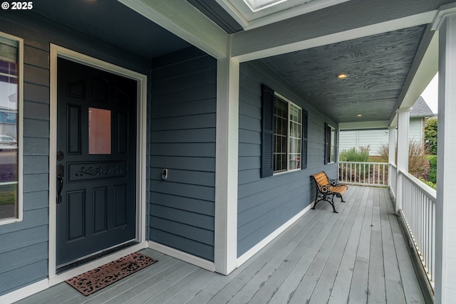 entrance to property with a porch