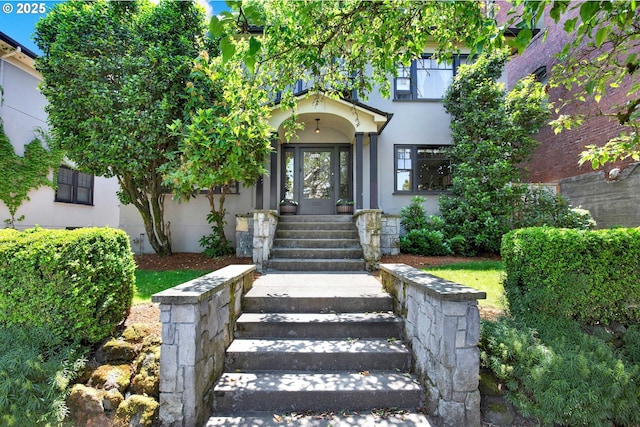 2066 NW Overton St, Portland, OR 97209 - view of exterior entry with stucco siding