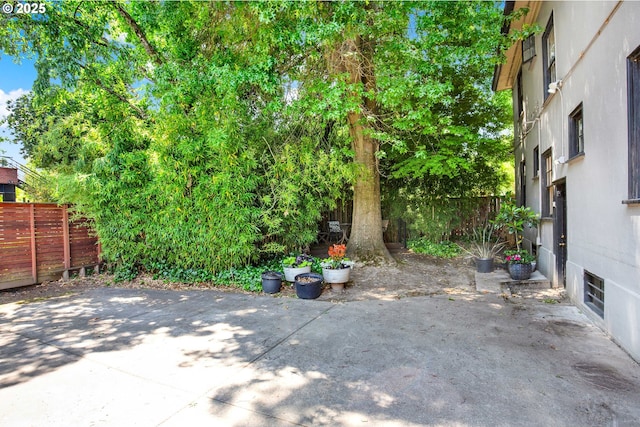 2066 NW Overton St, Portland, OR 97209 - fenced backyard with a patio