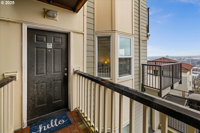 doorway to property with a balcony