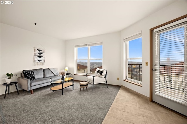 413 NW Uptown Ter Unit 2A, Portland, OR 97210 - living room with light tile patterned floors and baseboards