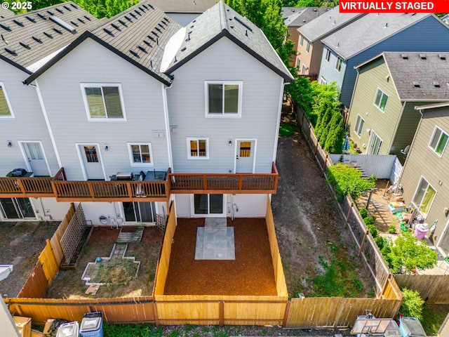 4578 NE Nicholson Loop, Vancouver, WA 98661 - back of house featuring a patio and a fenced backyard