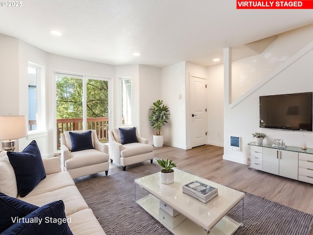 4578 NE Nicholson Loop, Vancouver, WA 98661 - living room with wood finished floors, recessed lighting, and baseboards
