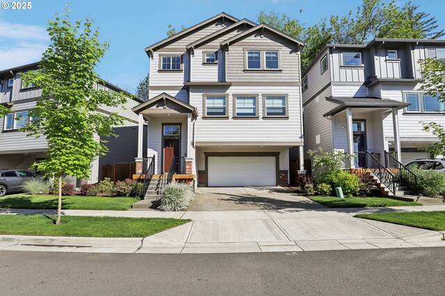 18315 SW Silvertip St, Beaverton, OR 97007 - view of front facade with concrete driveway and an attached garage
