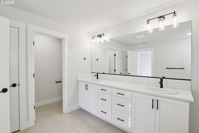 18315 SW Silvertip St, Beaverton, OR 97007 - full bath featuring double vanity, tasteful backsplash, and baseboards
