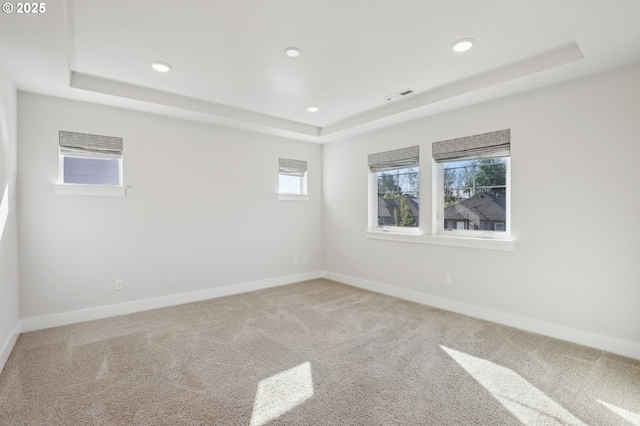 18315 SW Silvertip St, Beaverton, OR 97007 - carpeted spare room featuring a raised ceiling, baseboards, and recessed lighting