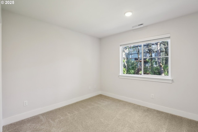 18315 SW Silvertip St, Beaverton, OR 97007 - empty room featuring light colored carpet and baseboards