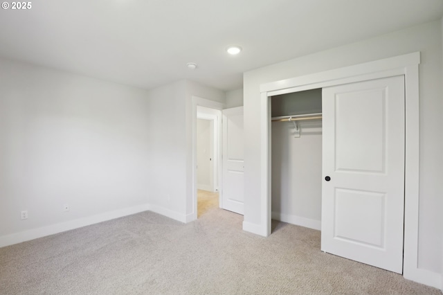 18315 SW Silvertip St, Beaverton, OR 97007 - unfurnished bedroom featuring light carpet, baseboards, a closet, and recessed lighting