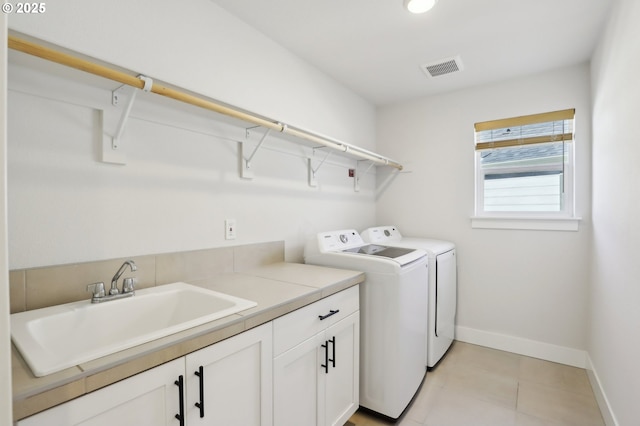 18315 SW Silvertip St, Beaverton, OR 97007 - laundry area with independent washer and dryer, baseboards, and cabinet space