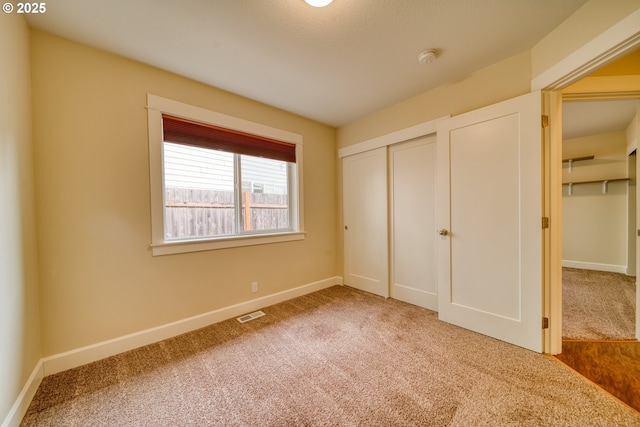 2639 Sykes Rd, Saint Helens, OR 97051 - unfurnished bedroom with carpet floors, baseboards, and a closet