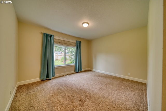 2639 Sykes Rd, Saint Helens, OR 97051 - unfurnished room featuring carpet, baseboards, and a textured ceiling