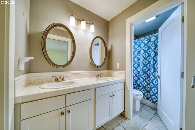 2639 Sykes Rd, Saint Helens, OR 97051 - full bathroom featuring toilet, double vanity, and tile patterned floors