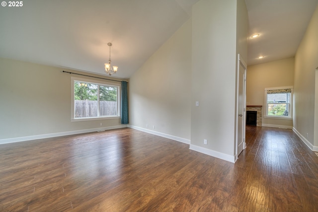 2639 Sykes Rd, Saint Helens, OR 97051 - spare room featuring a chandelier, healthy amount of natural light, dark wood-style flooring, baseboards, and recessed lighting