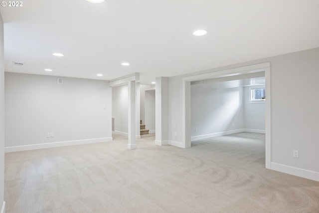 basement with light carpet