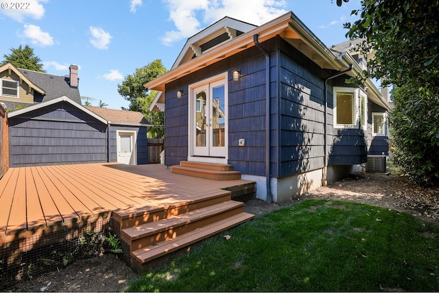 exterior space with a lawn and cooling unit