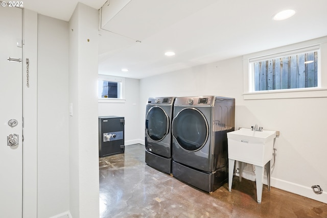 laundry area with washer and clothes dryer