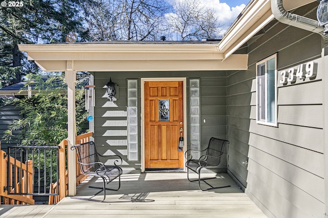 entrance to property with a porch