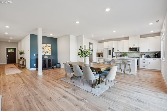 12545 SW Palermo St, Wilsonville, OR 97070 - dining space with light wood-type flooring, recessed lighting, and baseboards