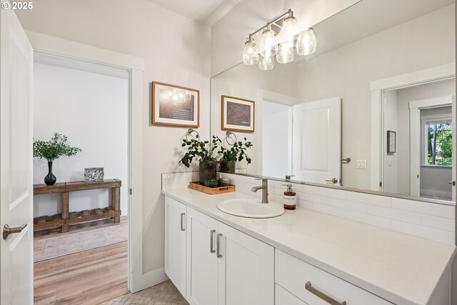 12545 SW Palermo St, Wilsonville, OR 97070 - bathroom with vanity, baseboards, and a chandelier