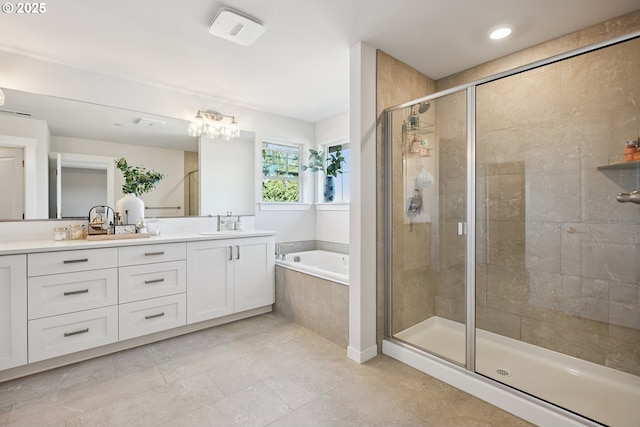 12545 SW Palermo St, Wilsonville, OR 97070 - full bathroom with double vanity, a bath, a shower stall, tile patterned floors, and recessed lighting