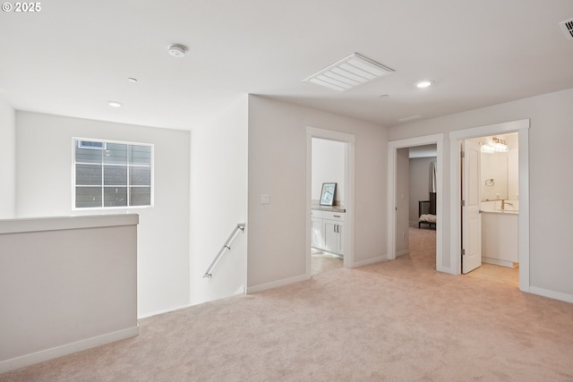 12545 SW Palermo St, Wilsonville, OR 97070 - empty room featuring light carpet, baseboards, recessed lighting, and a smoke detector