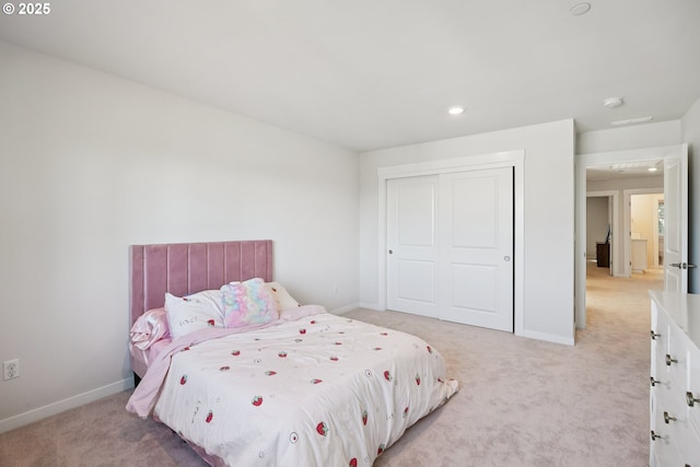 12545 SW Palermo St, Wilsonville, OR 97070 - bedroom featuring light carpet, a closet, baseboards, and recessed lighting