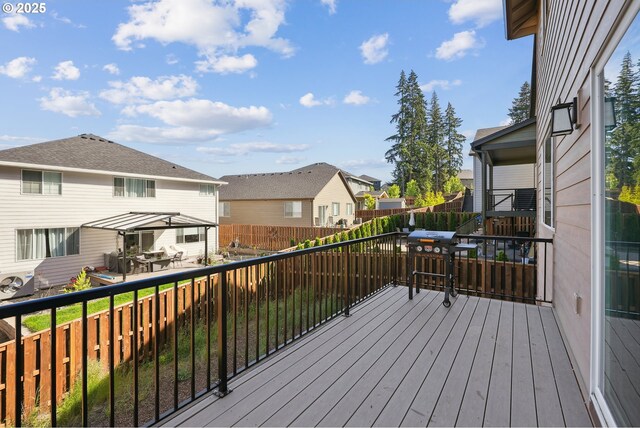 12545 SW Palermo St, Wilsonville, OR 97070 - wooden deck with a residential view, ac unit, and a fenced backyard