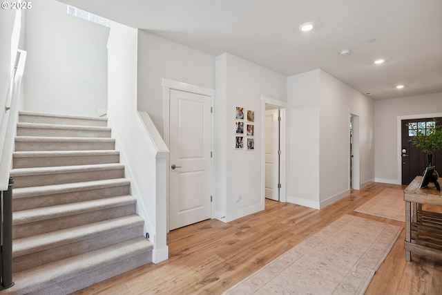 12545 SW Palermo St, Wilsonville, OR 97070 - entrance foyer with light wood-style flooring, stairs, recessed lighting, and baseboards