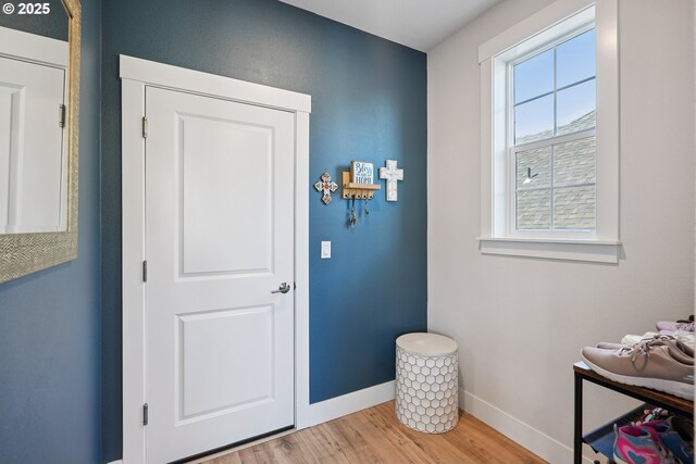 12545 SW Palermo St, Wilsonville, OR 97070 - doorway to outside featuring baseboards and wood finished floors