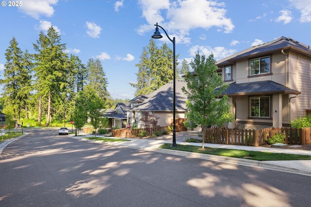 12545 SW Palermo St, Wilsonville, OR 97070 - view of front of property with stucco siding and a residential view