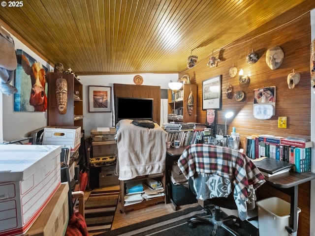 home office featuring wood finished floors, wood ceiling, and wood walls