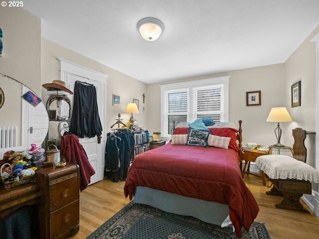 bedroom with light wood-type flooring