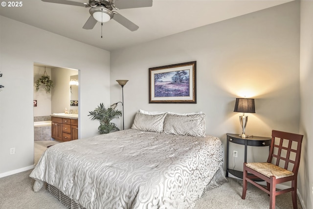 bedroom with carpet flooring and connected bathroom